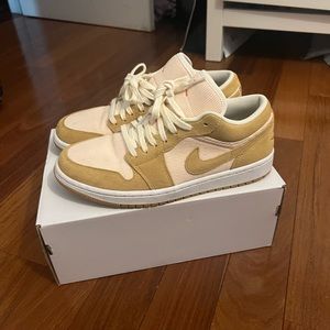 Woman’s size 11 air Jordan 1 lows; Twine Orange Quartz